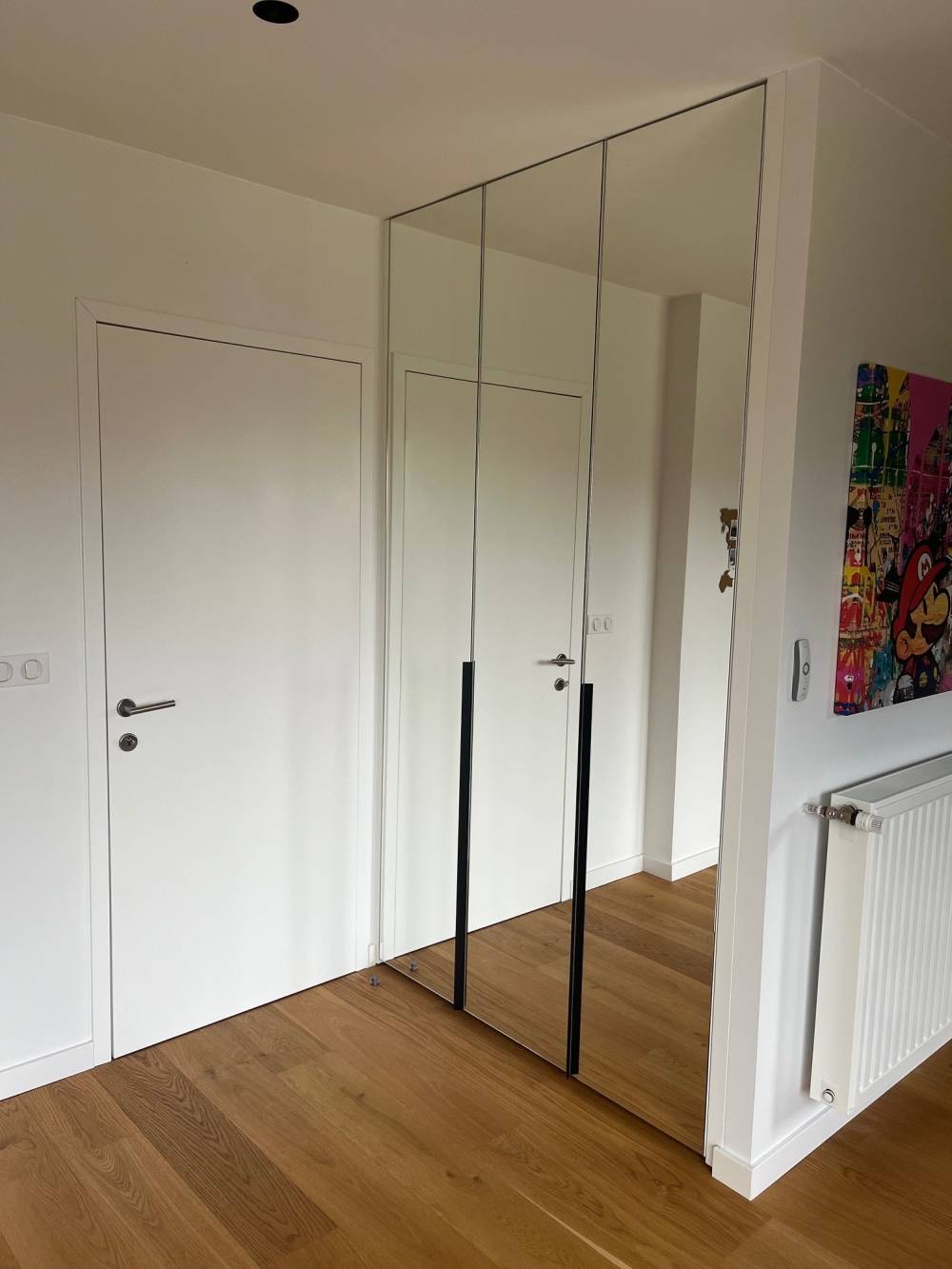 Placard portes miroir poignees noires chambre — Mood Inside, agenceur à Annecy